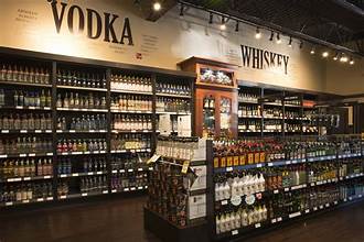 Liquor store interior with organized shelves displaying premium spirits and wines for perfect selection
